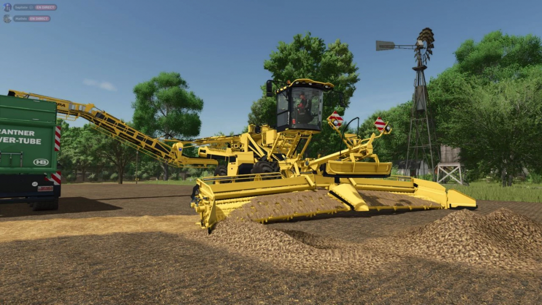 Farming Simulator 25 mod: Ropa Maus 5 v1.0.0.0 yellow soil cultivator on farmland, with trees and blue sky background.