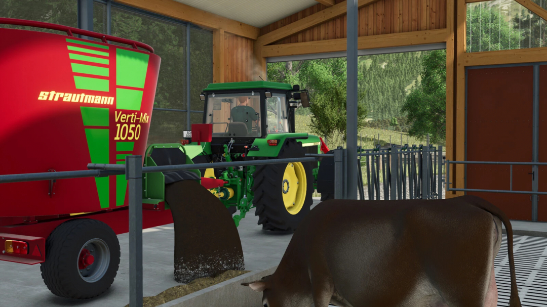 Farming Simulator 25 mod: Green tractor with Strautmann Verti-Mix 1050 feed mixer inside a barn with a brown pig in the foreground.