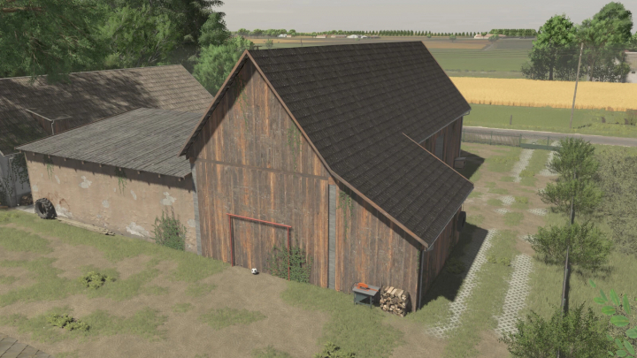 fs25-mods,  Barn with a cowshed mod from Farming Simulator 25, featuring wooden structure and outdoor equipment. For FS25 mods, enhance your farm.