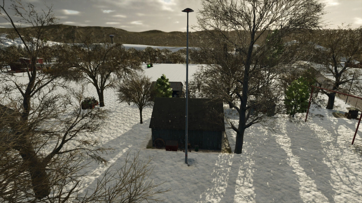 fs25-mods,  Snow-covered yard with leafless trees, a small shed, and a tall streetlamp in a winter rural landscape for Farming Simulator 25 mods.