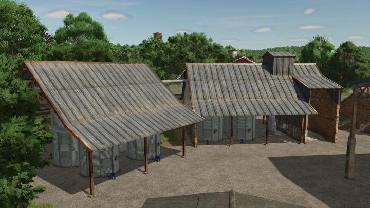 fs25-mods,  Farming Simulator 25 mod: Agribusiness barn with silos and weathered metal roofs for crop storage in FS25 mods.