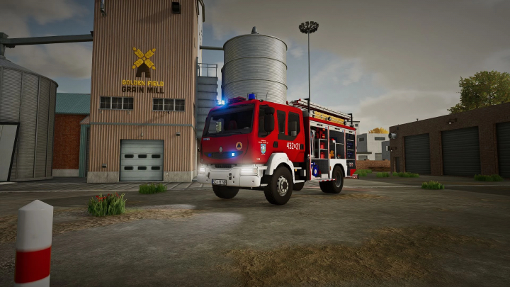 fs22-mods,  Farming Simulator 22 mod: Fire truck parked outside Golden Field Grain Mill, detailed and realistic in-game firefighting vehicle.