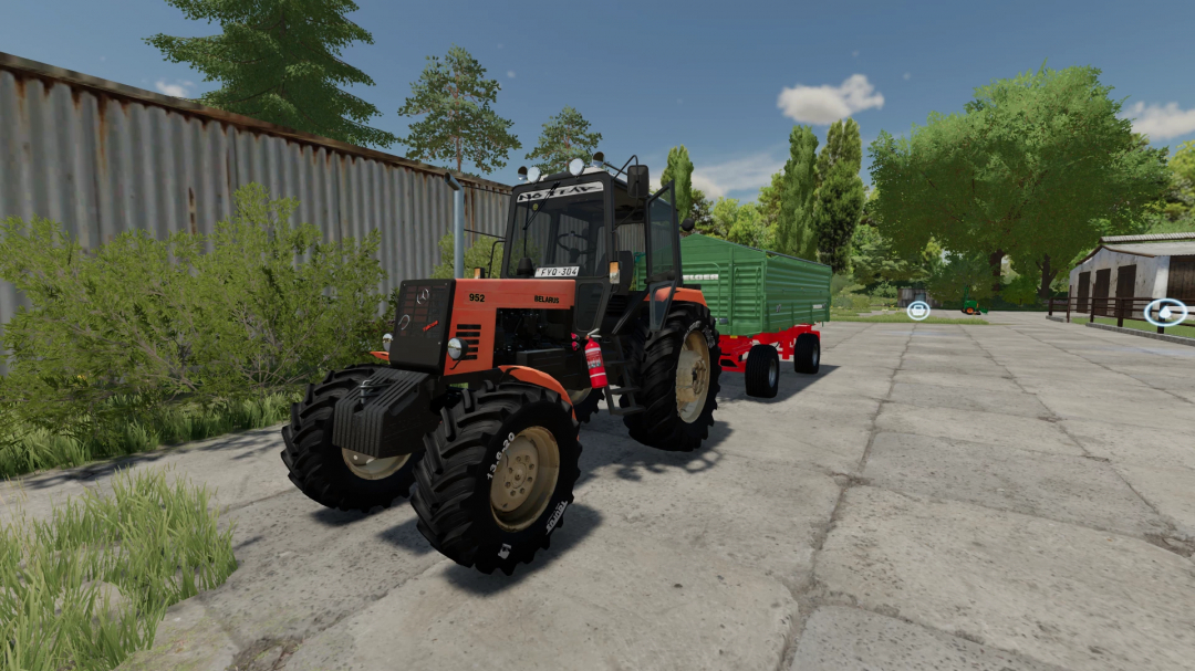 Farming Simulator 22 mod: Belarus 952 tractor with green trailer parked on farm yard.