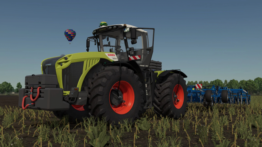 Claas Xerion 4200 tractor mod in Farming Simulator 25 on a farm field with a seed drill attachment, showcasing FS25 mods.