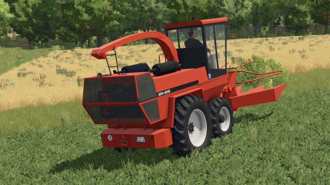 Farming Simulator 25 mod: Fahr SFH 4010 II, a red forage harvester on a farm field with trees in the background.