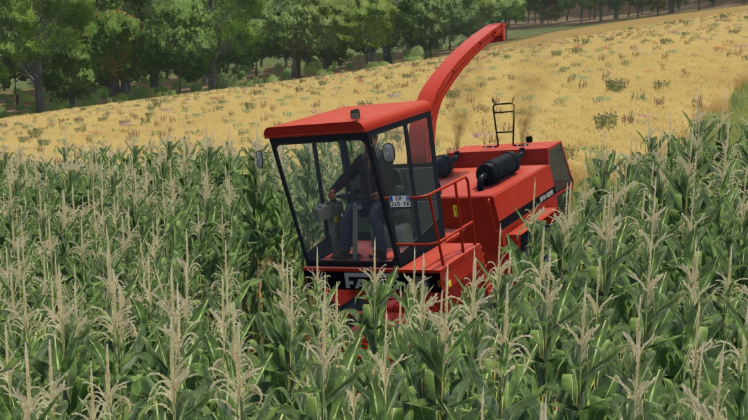 Farming Simulator 25 mod: Red Fahr SFH 4010 II harvester in a cornfield with green trees in the background.