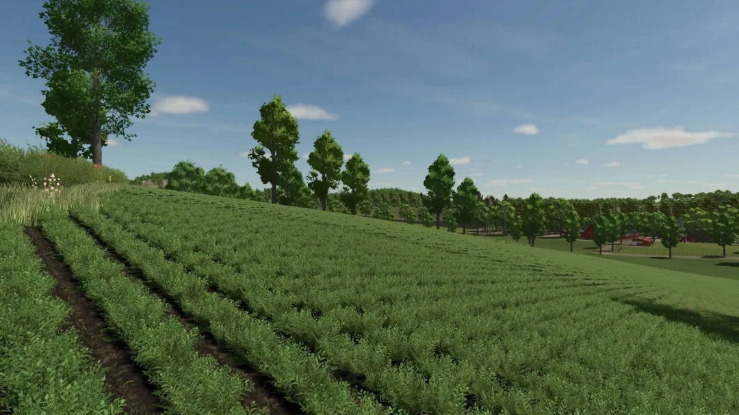 Peaceful farmland scene from Farming Simulator 25 with lush green fields, trees, and clear blue sky, featuring Feliz Map v1.3.0.0 mod.
