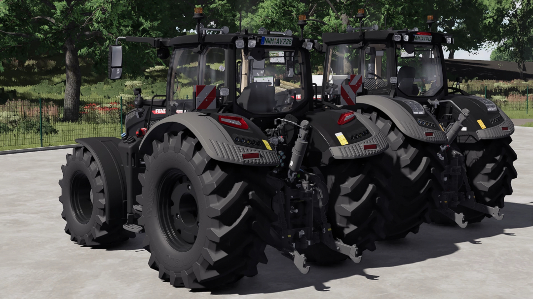 Fendt 700 v1.0.0.0 mod for Farming Simulator 25, showcasing two large tractors with detailed tires and attachments, in a farmyard setting.