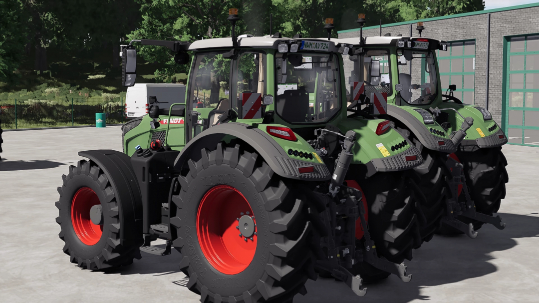 Fendt 900 v1.0.0.0 mod tractors from Farming Simulator 25, with large tires and detailed cab, shown in a farmyard setting.