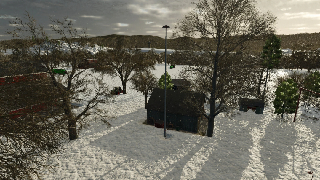 Winter farm scene with snow-covered ground, trees, a small shed, and farm equipment in Farming Simulator 25 mods. Fire Siren v1.1.0.0.