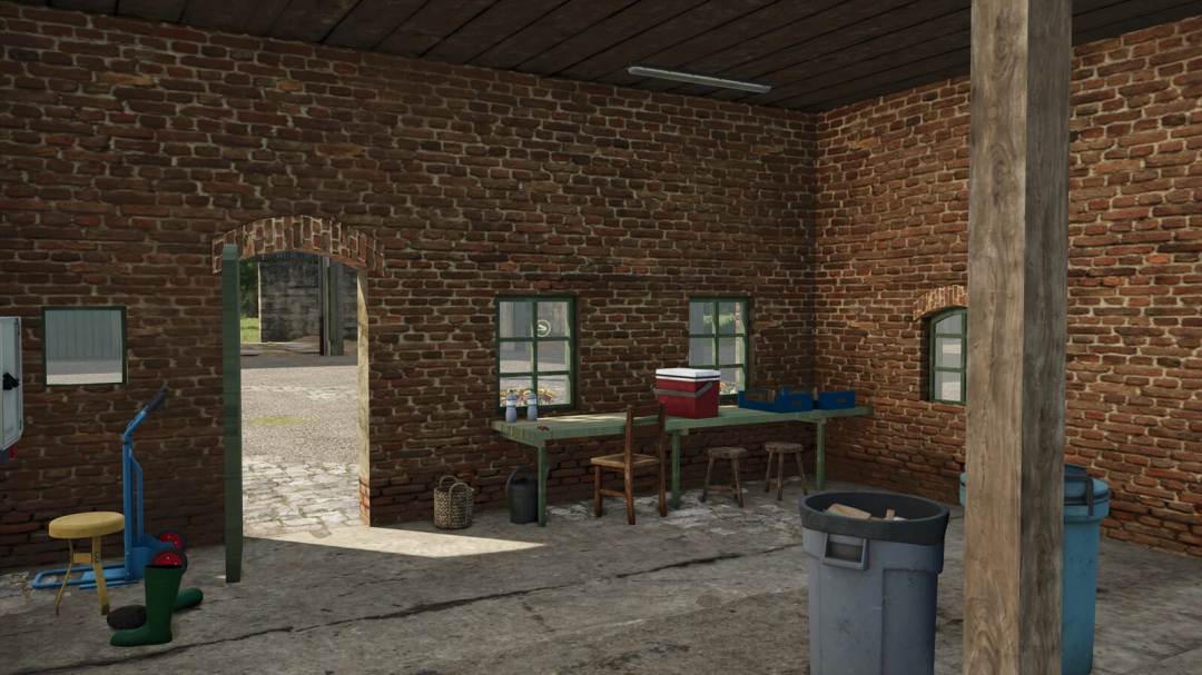 Inside a rustic barn, a workbench with supplies, chairs, and farming tools, part of the Ivoy Farm Garage mod for Farming Simulator 25.