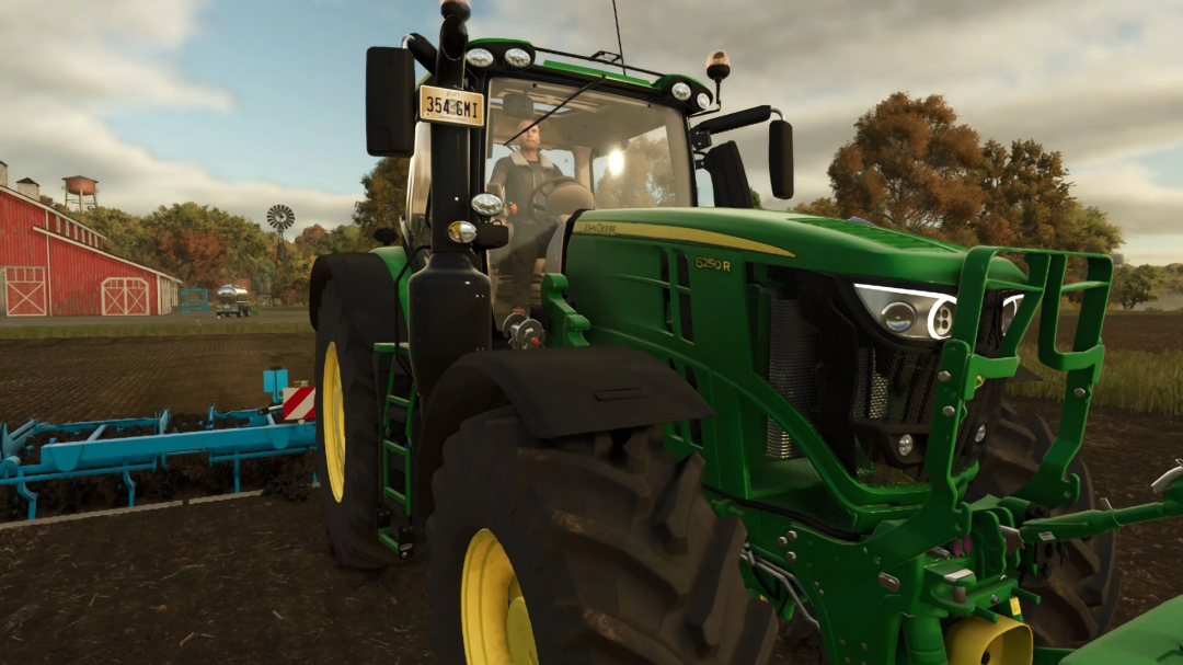Farming Simulator 25 mod: John Deere 6R v1.0.2.1 tractor with modern design, working in a field during sunset.