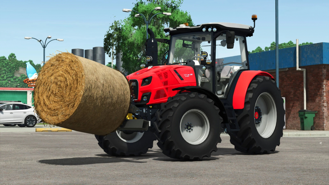 Farming Simulator 25 mod — red tractor with a large hay bale, part of FS25 mods collection.