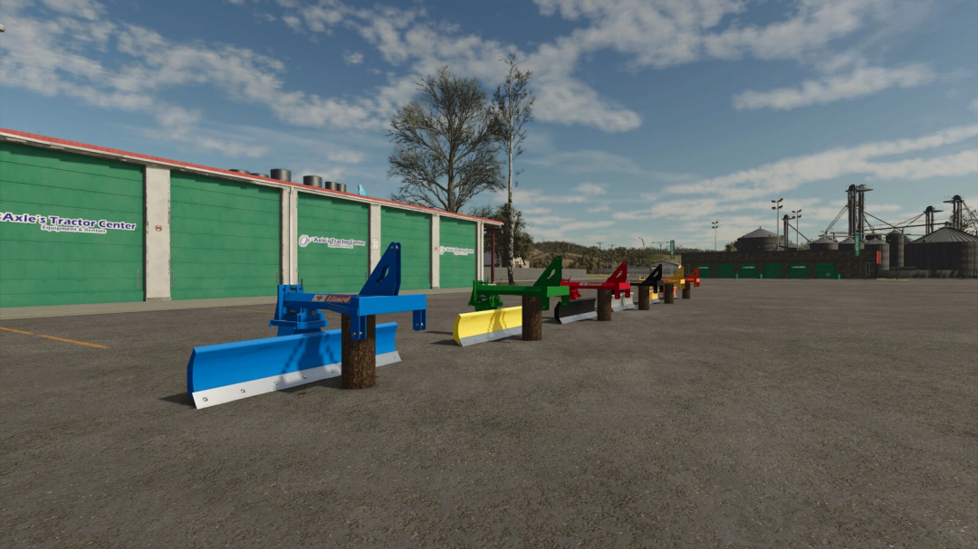 Farming Simulator 25 mods: Collection of colored V-plow attachments from the Lizard LT Pack v1.0.0.0, displayed in a farm yard.