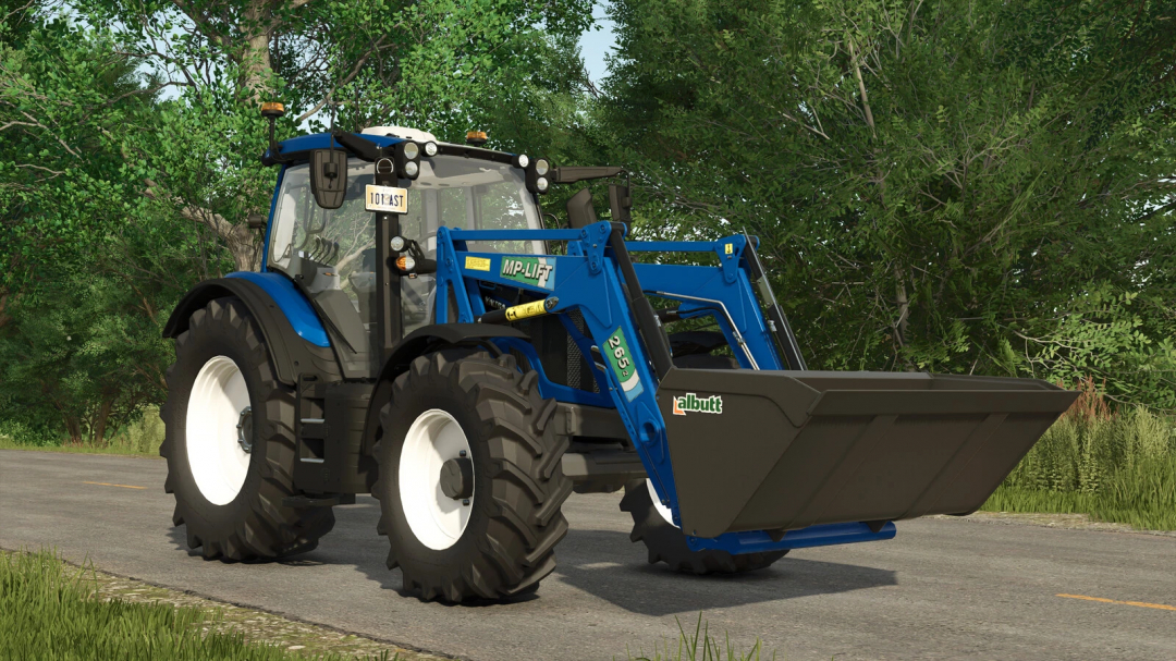 Farming Simulator 25 mod: MP-Lift frontloaders on a blue tractor with a front bucket, parked on a rural road with trees in the background.
