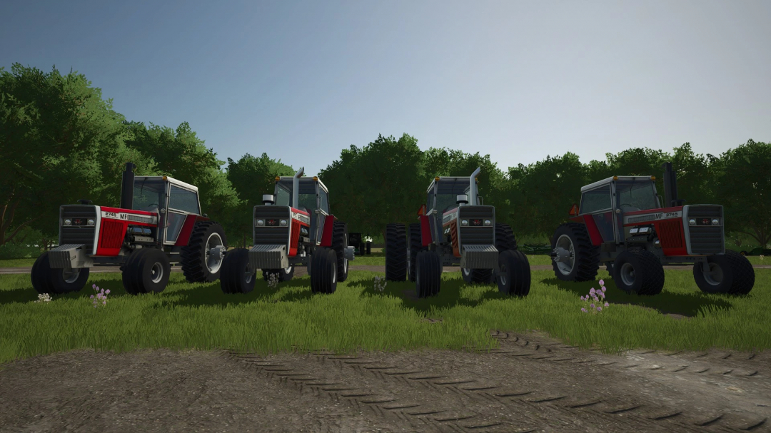 Four Massey Ferguson 2000 Series tractors from FS25 mods lined up in a field with green trees in the background.