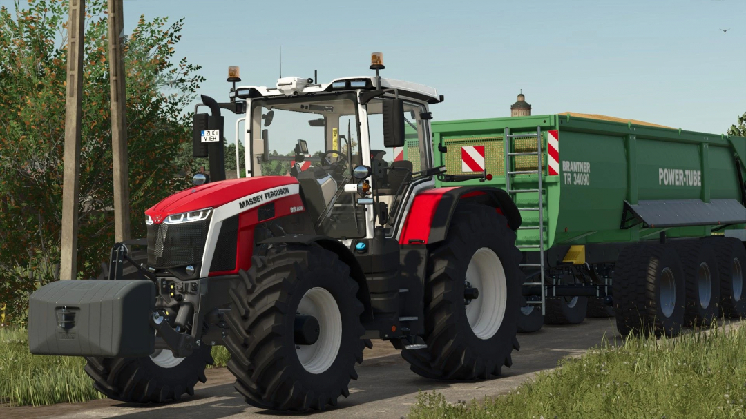 Farming Simulator 25 mod featuring a Massey Ferguson 8S tractor with a green Power-Tube trailer on a farm road.