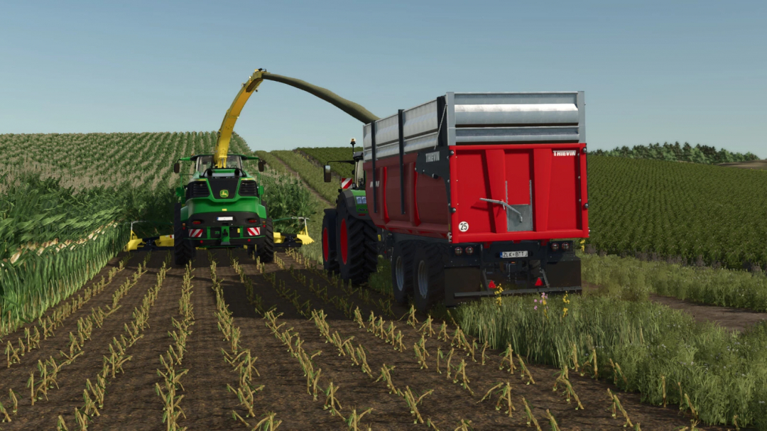 Farming Simulator 25 mod showing a John Deere tractor with a forage harvester collecting crops on a field, with a Thievin CORTAL 210-72 v1.0.0.1 trailer attached.