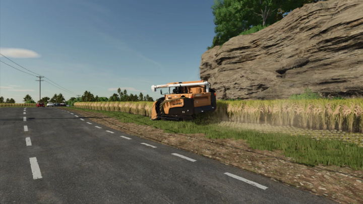 fs25-mods,  Farming Simulator 25 mod image showing rice field work with a harvesting machine on a rural road.