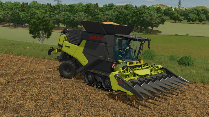 fs25-mods, Farming Simulator 25 mod: CLAAS Harvester 500.000 Edition Pack v1.0.0.0 working in a field with a wide load label.