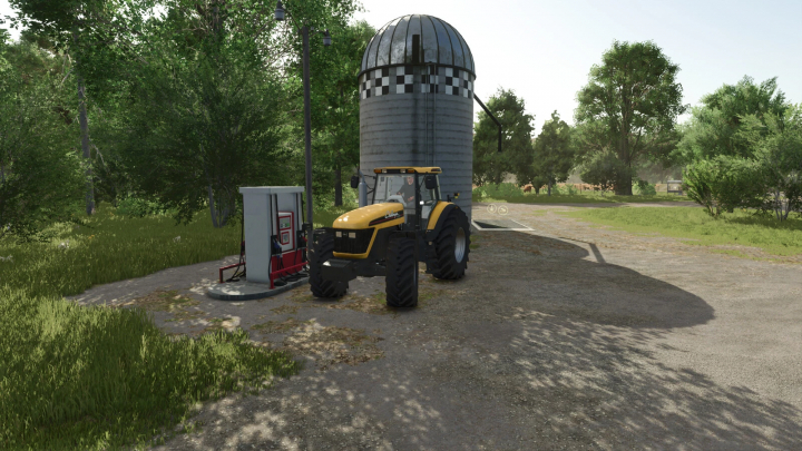 fs25-mods, Farming Simulator 25 mod showing a tractor refueling at a gas station with a silo in the background, part of FS25 mods.