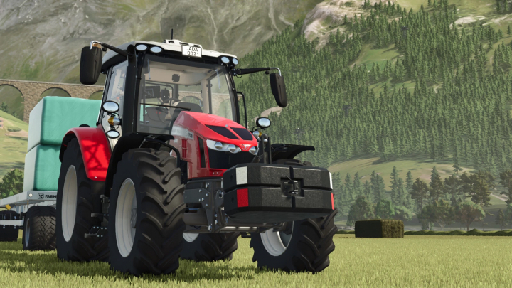 fs25-mods, Farming Simulator 25 mod featuring a red tractor with a weight pack attached, set in a lush farm landscape with mountains in the background.