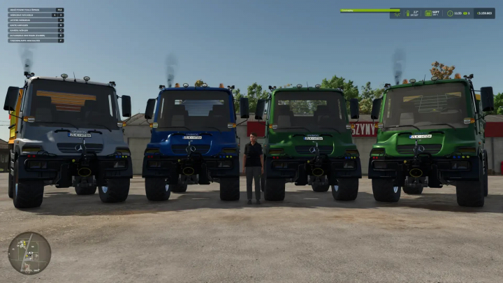 fs25-mods, Screenshot of four different colored Unimog U400 trucks from Farming Simulator 25 with a person standing between the second and third vehicle.