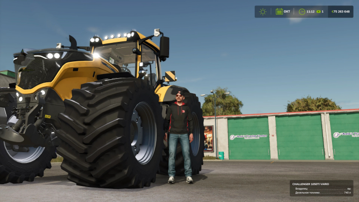 fs25-mods,  Farming Simulator 25 mod featuring the Challenger 1050 tractor with a person standing beside it, displayed in an outdoor setting.