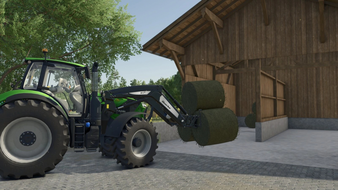 Farming Simulator 25 mod—tractor with autoload balefork loading hay bales into a barn, showcasing FS25 mods and equipment.