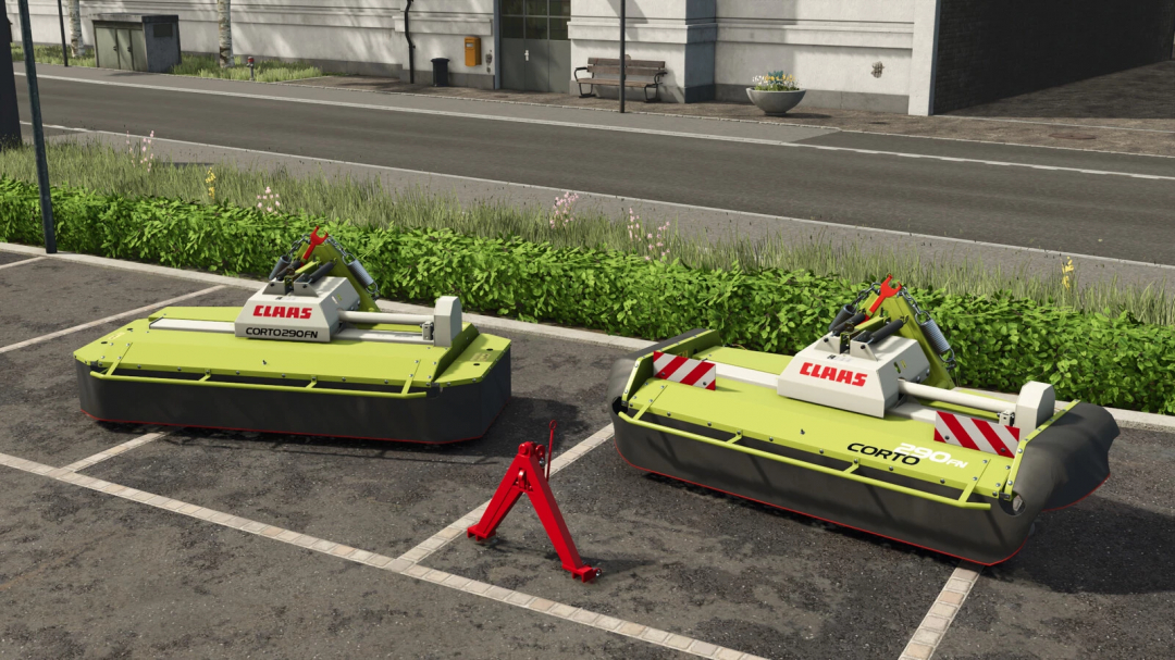 Two CLAAS CORTO mowers from FS25 mods parked on a parking lot, ready for farming tasks.