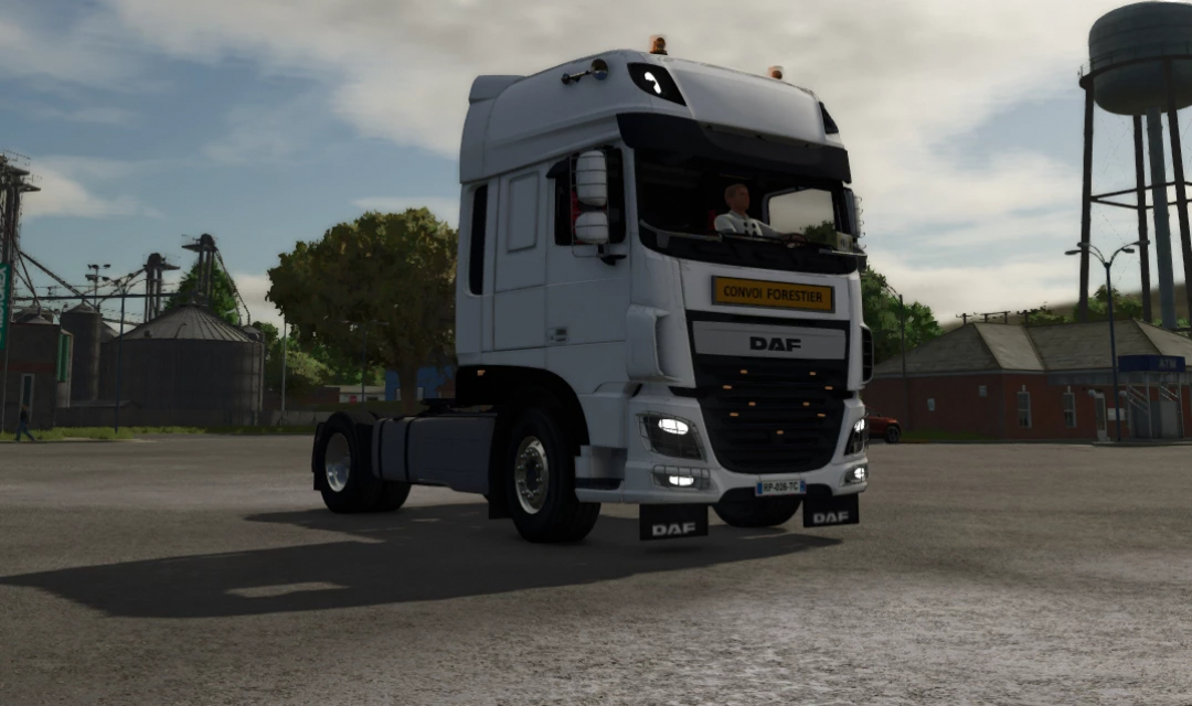 Farming Simulator 25 mod featuring a DAF XF 106 truck with 'Convoi Forestier' sign, used for forestry transport.