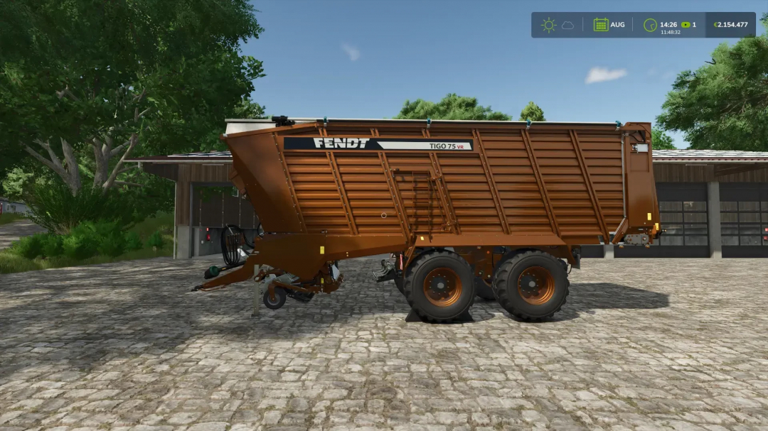 Fendt Tigo75VR v1.0.0.4 mod in Farming Simulator 25, showing a brown agricultural trailer with dual wheels, parked on a cobblestone surface.