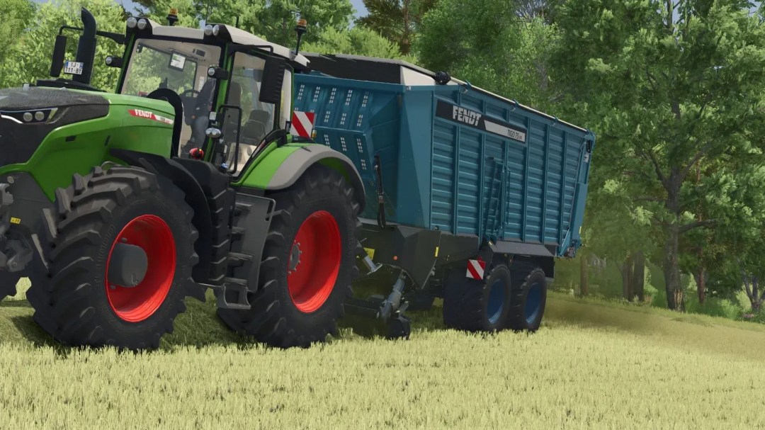 Fendt Tigo75VR mod attached to a green tractor in Farming Simulator 25, used for farming tasks, with lush green trees in the background.