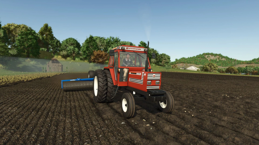 Farming Simulator 25 mod: Red Fiatagri 90 Series tractor working on a farm field in FS25.