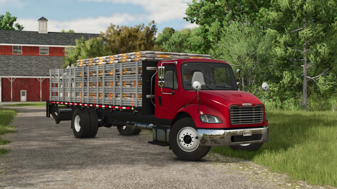 Farming Simulator 25 mod: Freightliner M2 Stakebed truck with orange pipes, parked on a farm with trees and a barn in the background.