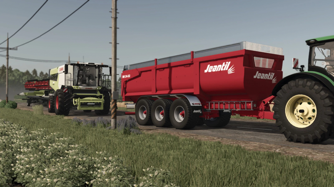 Farming Simulator 25 mod: Closer view of a Claas cotton harvester pulling a red Jeantil BR 24-32 trailer on a rural road.