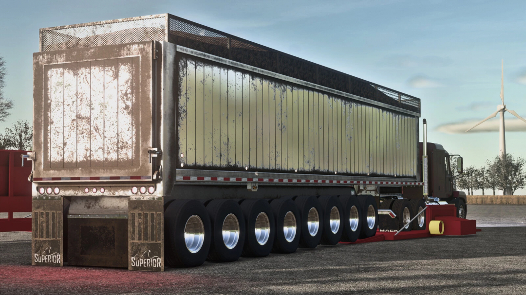 FS25 mod: Lizard Superior End Dump Trailer Pack v1.0.0.0 for Farming Simulator 25, realistic heavy-duty trailer on gravel with wind turbines in the background.