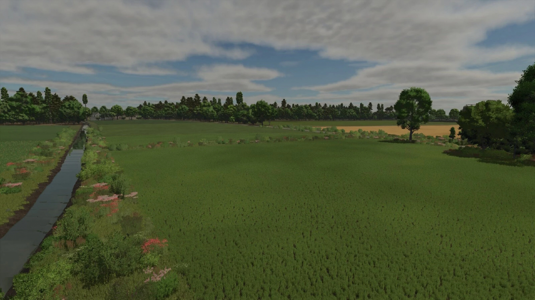 Scenic farming landscape from Farming Simulator 25 with green fields, trees, and a canal, featuring the Nordkirchen Map mod v1.0.0.0.