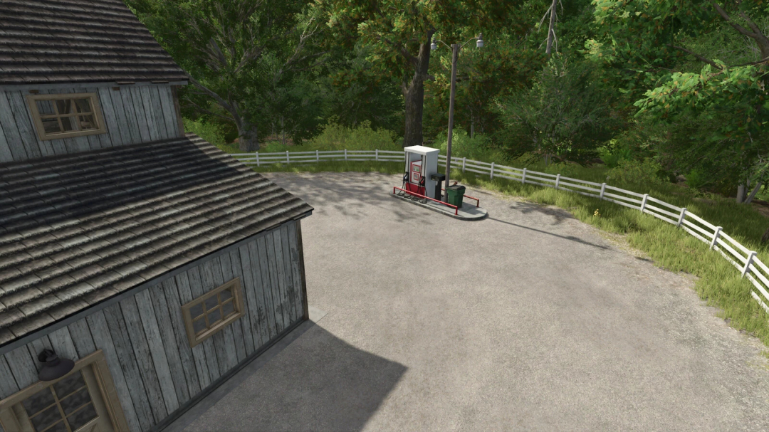 Placeable Gas Station v1.0.0.0 mod from Farming Simulator 25, featuring a small gas pump on a rural farmyard with trees and a white fence.