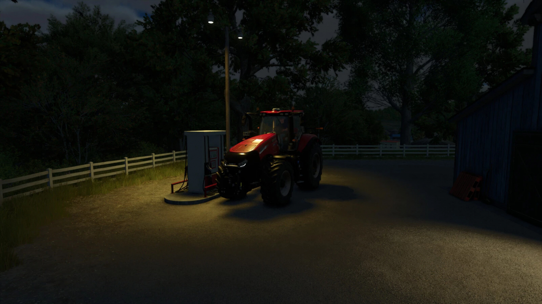 Farming Simulator 25 mod: Placeable Gas Station v1.0.0.0 with a tractor refueling at night.