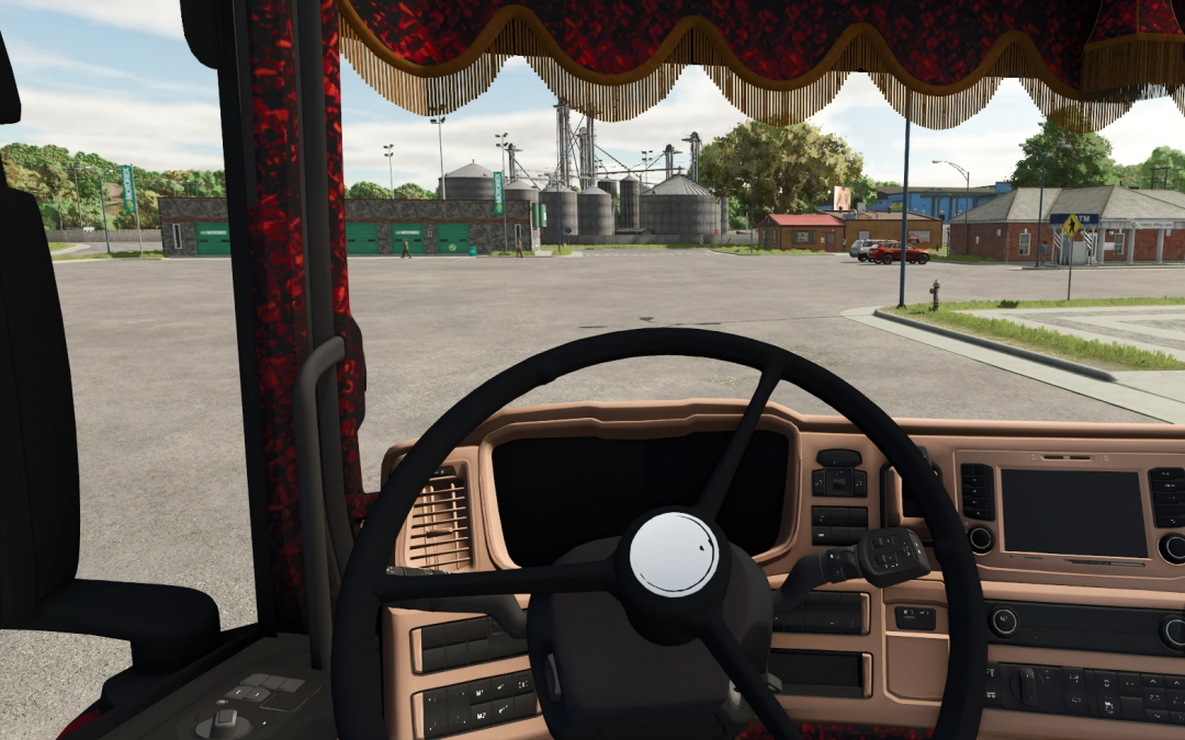 Inside view of a Scania R650 truck cab in Farming Simulator 25, showing the dashboard, steering wheel, and a view of the farm environment outside.