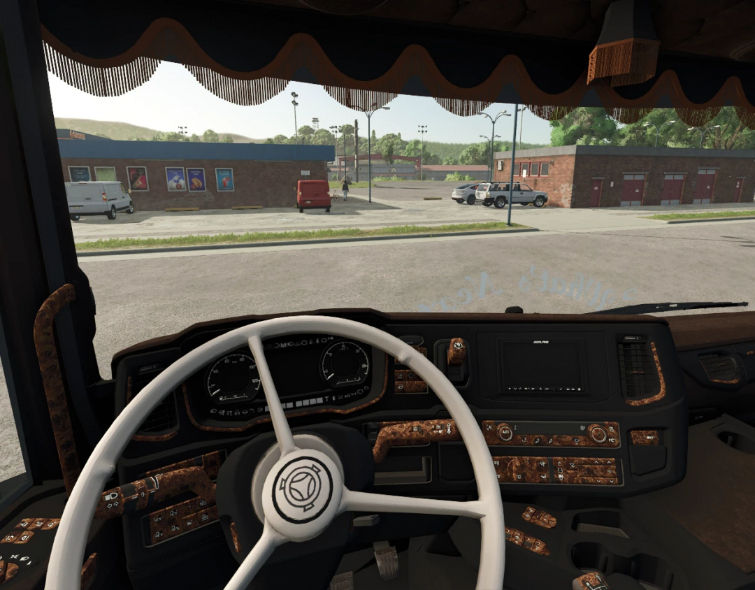 Interior of a Scania truck mod from Farming Simulator 25, showcasing the dashboard and steering wheel with mod details.