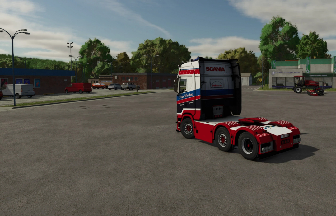 In Farming Simulator 25, a Scania S520 mod truck is parked in a truck stop area with trees and vehicles in the background.