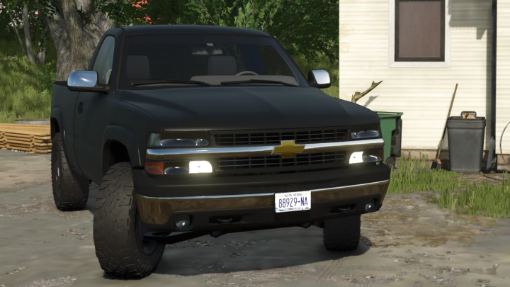 fs25-mods, Farming Simulator 25 mod showcasing a black Chevrolet Silverado 1500 pickup truck from the 2002 mod pack.
