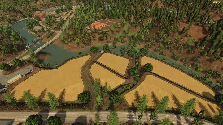 fs25-mods,  Aerial view of farmland with fields, trees, a river, a bridge, and road in Farming Simulator 25 with AgroForests mod.