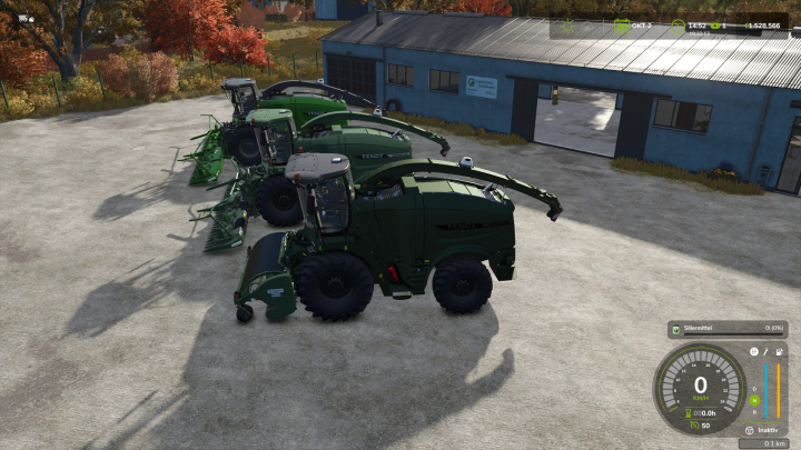 fs25-mods,  Farming Simulator 25 mods: lineup of green Fendt Katana pack harvesters with attached headers parked outside a blue building on a farm yard.