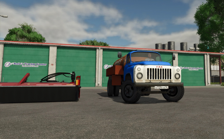 fs25-mods, Farming Simulator 25 mod GAZ 53KO truck parked at Axle's Tractor Center in the game.