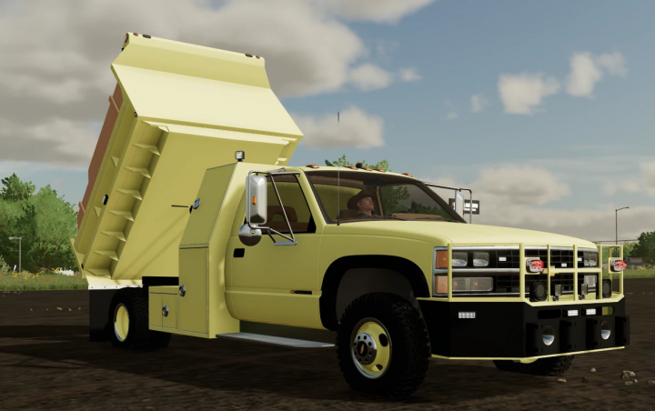 fs22-mods, Farming Simulator 22 mod: GMT400 Dumptruck ND in light yellow with tilting bed, used for hauling and dumping materials.
