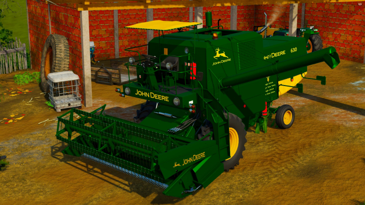 fs22-mods, John Deere 630 combine harvester mod in Farming Simulator 22, green color with yellow accents, parked on a farm.