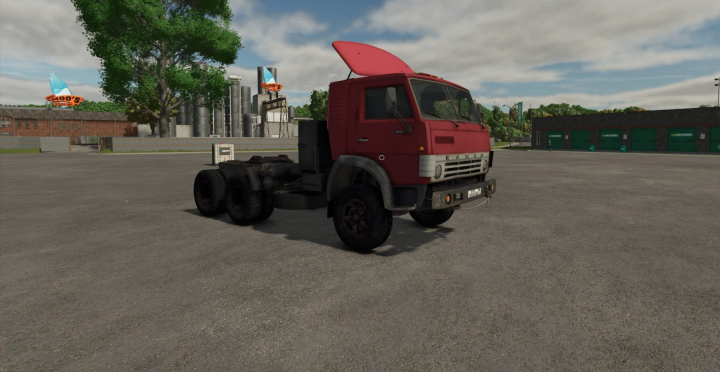 fs25-mods, Farming Simulator 25 mod: Red KamAZ 5410 truck without trailer in a parking lot, part of FS25 mods collection.